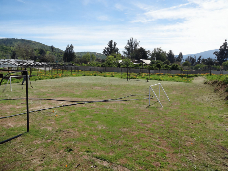 Parcela con casa y potencial uso comercial, Limache