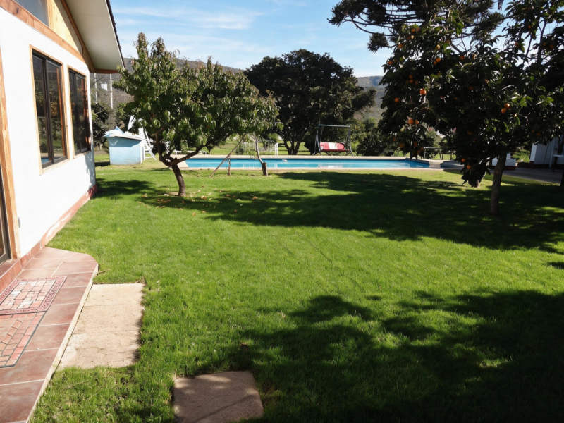 Parcela con casa y potencial uso comercial, Limache